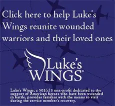 A blue sign with the words luke 's wings
